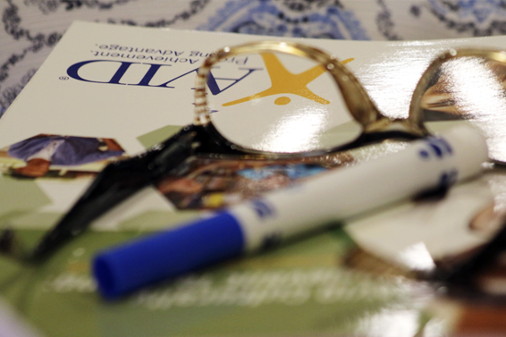 A picture of glasses sitting on an AVID notebook